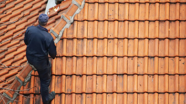 Roofer Doing Roof Maintenance